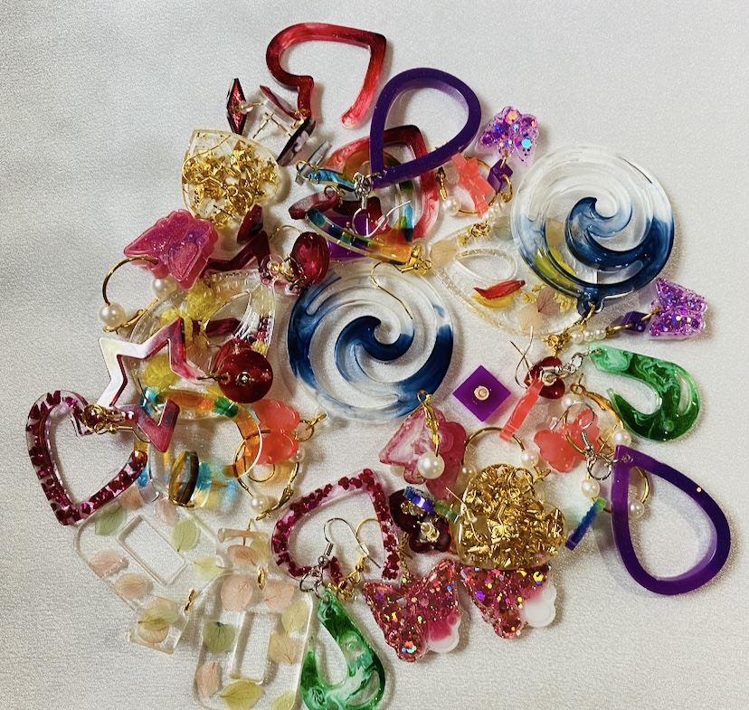 Resin earring flat-lay collection — handcrafted resin art by Resin Gallery by Suu